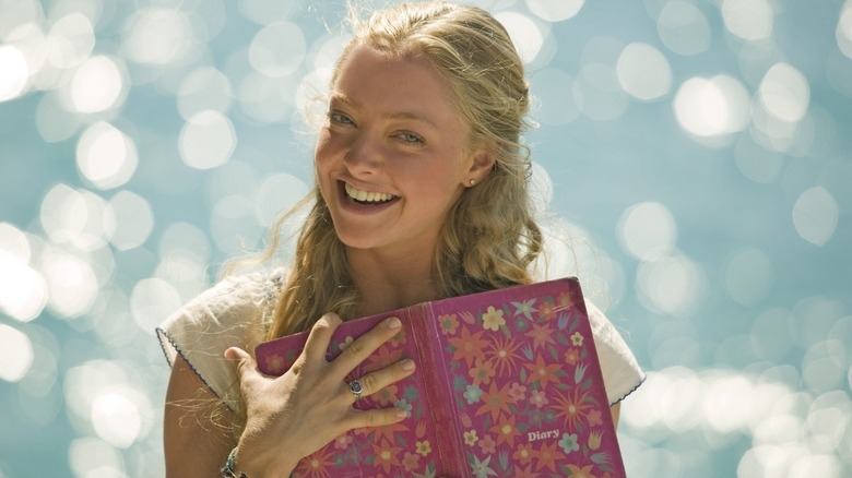 Sophie holds her mom's diary in "Mamma Mia!" (2008)