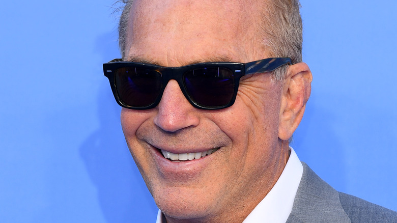 Kevin Costner smiling sunglasses