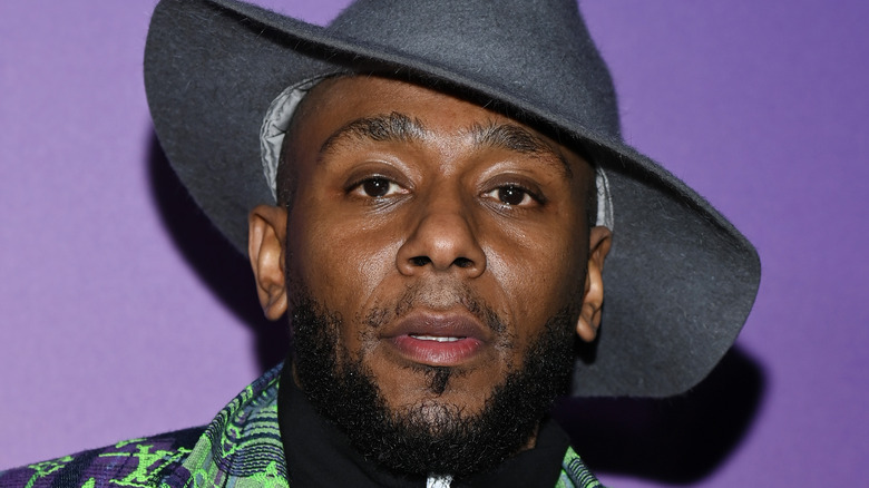 Yasiin Bey in pointy hat