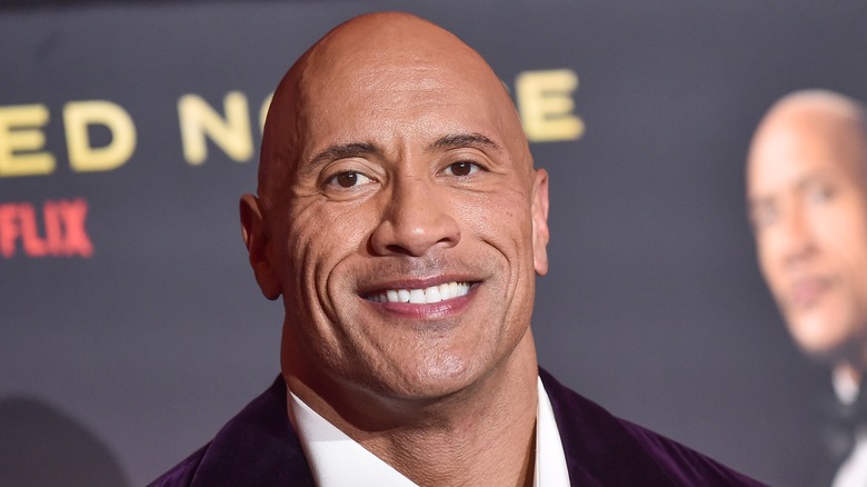 The Rock smiles on the red carpet