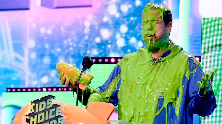 Adam Sandler covered in slime