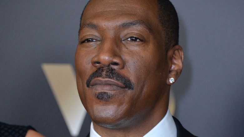 Eddie Murphy pursing lips