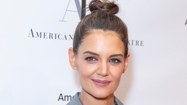 Katie Holmes smiles at a red carpet event