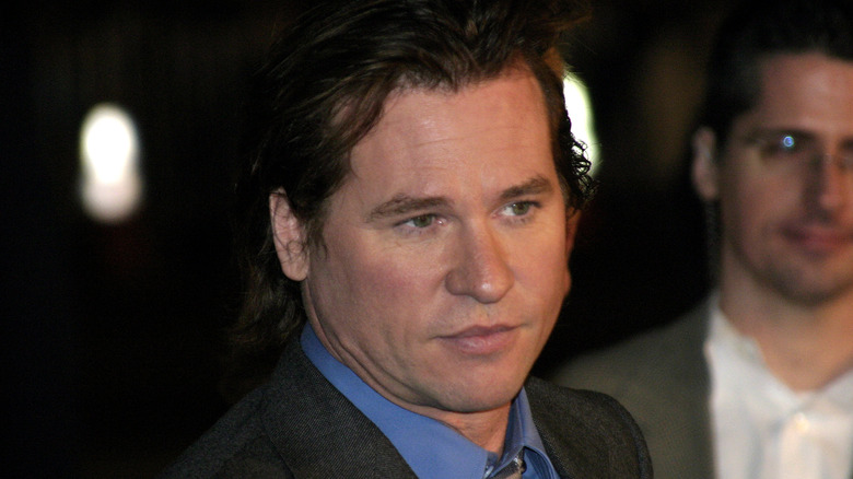 Val Kilmer posing at premiere