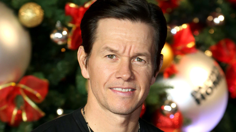 Mark Wahlberg in front of christmas decorations