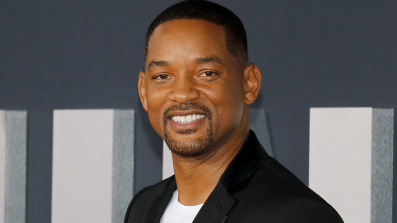 Will Smith smiles