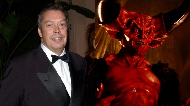 Tim Curry smiles at the camera