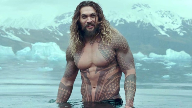 Aquaman standing in water