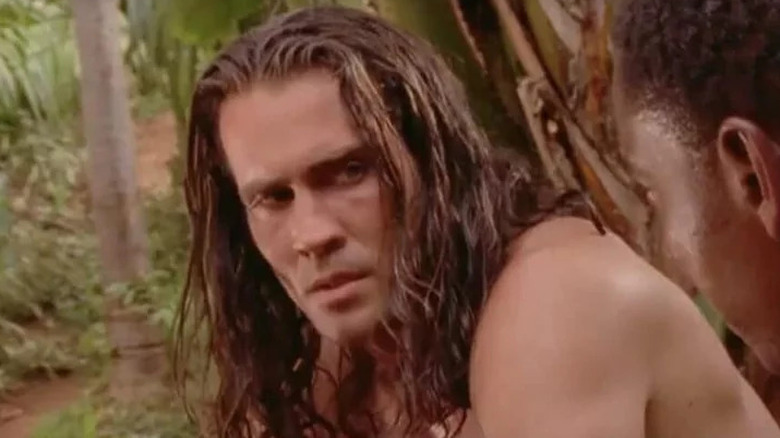 Joe Lara as Tarzan listening