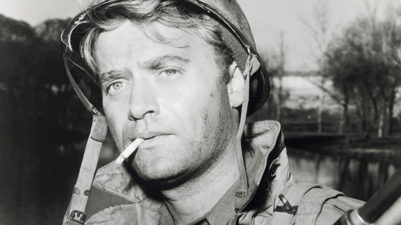 Vic Morrow smoking on set