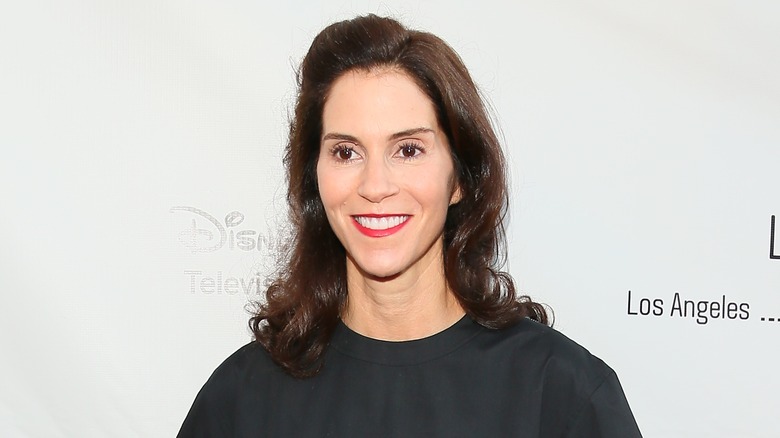 Jamie Gertz smiles