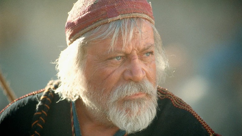 Oliver Reed looks off into the distance