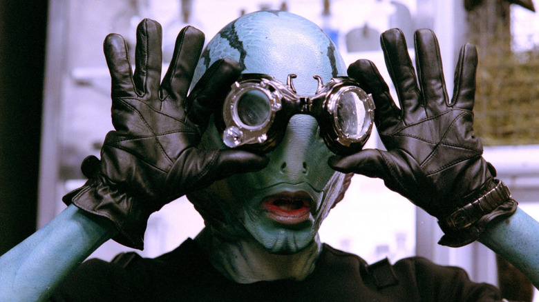 Abe Sapien adjusting goggles