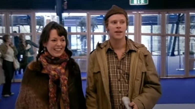 Olivia Colman and Robert Webb grin