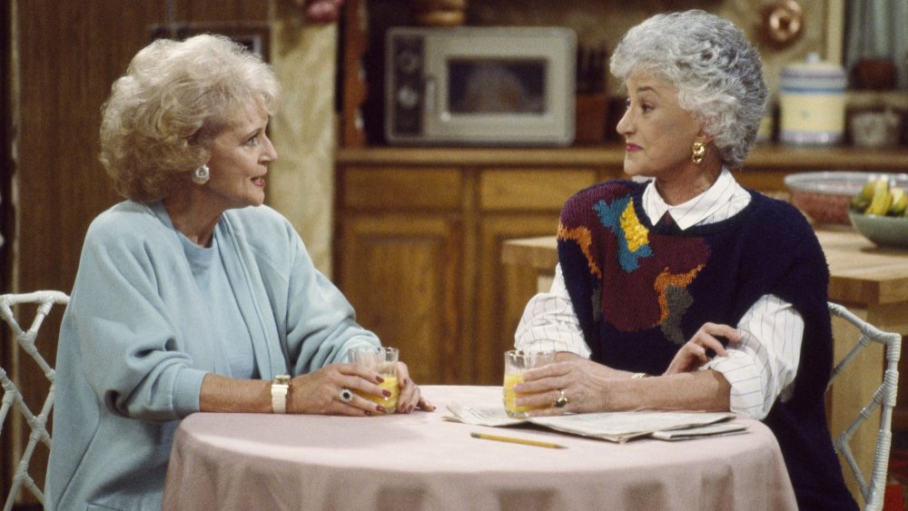 Betty White talking to Bea Arthur