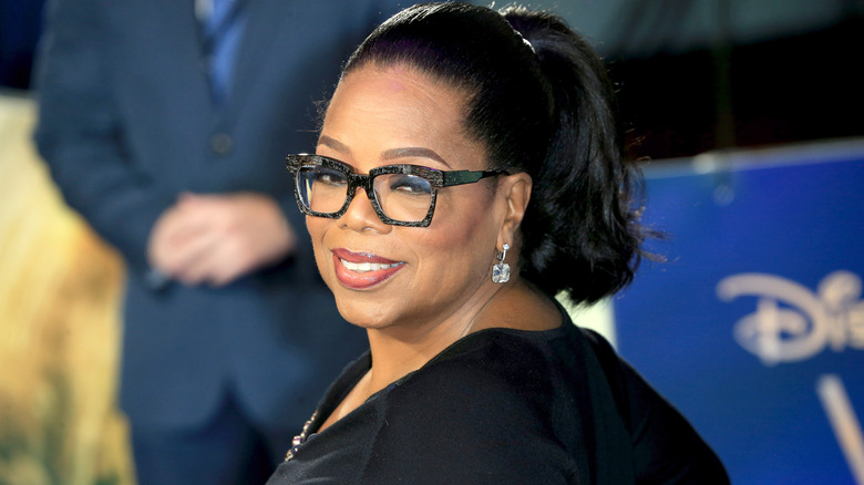 Oprah Winfrey wearing black glasses