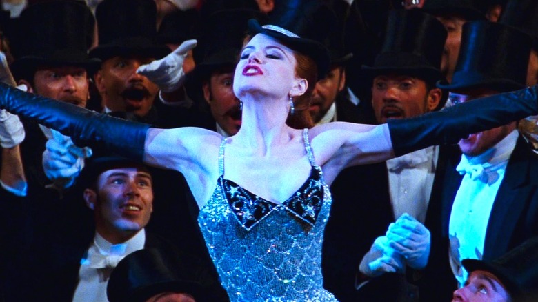 Satine performing wearing top hat