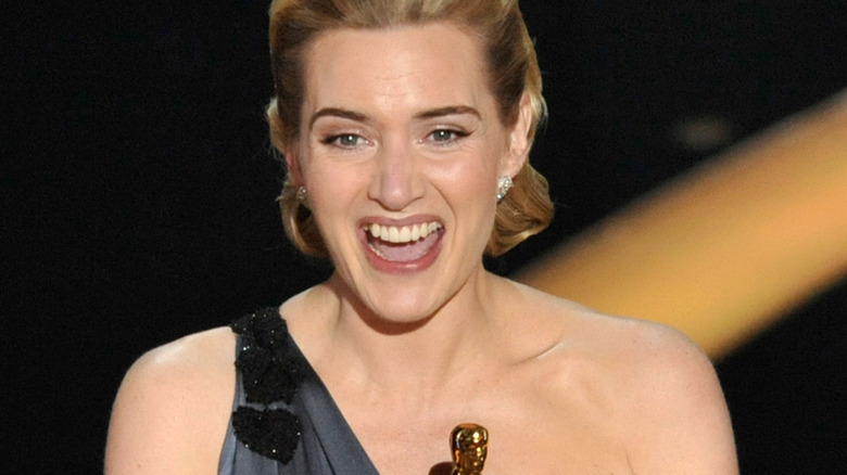 Kate Winslet celebrates her Oscar.