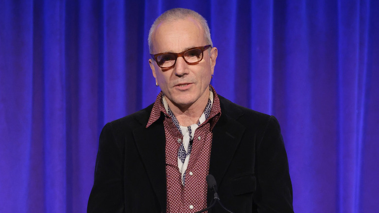 Daniel Day-Lewis in front of curtain