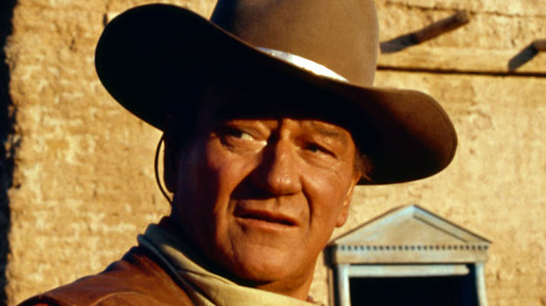 John Wayne looks over his shoulder