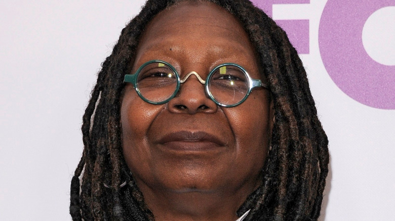 Whoopi Golberg smiles