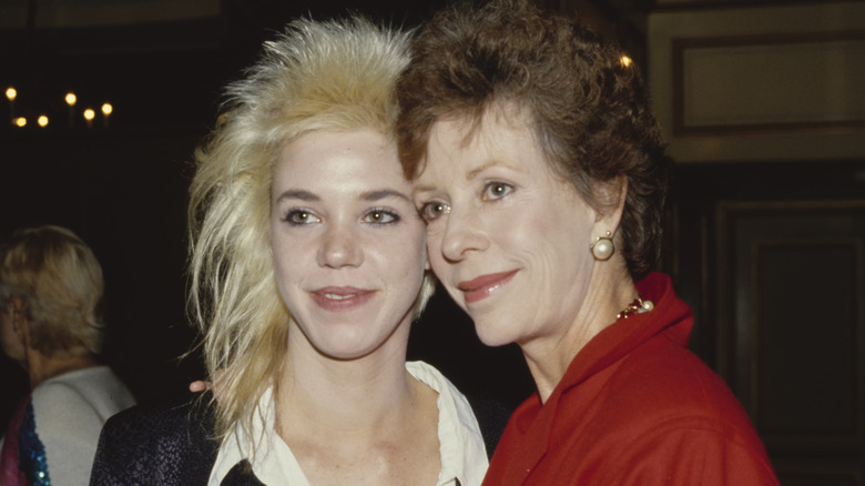 Carol Burnett and Carrie Hamilton stand together