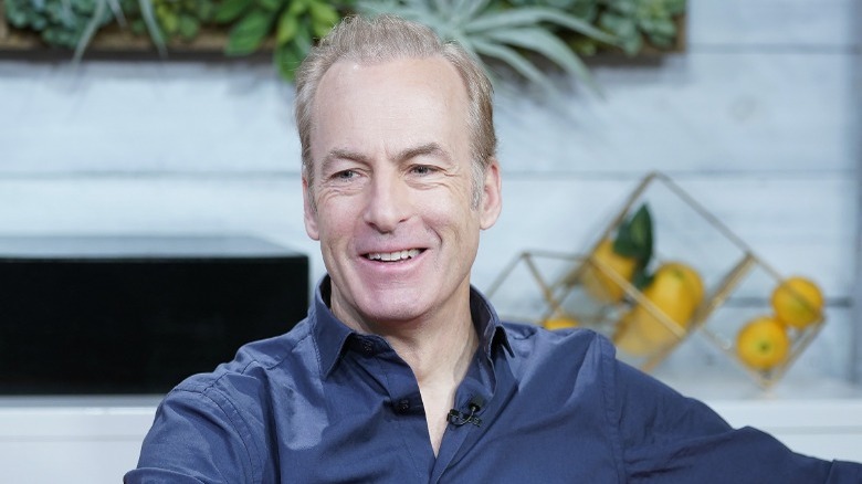 Bob Odenkirk reclines with smile