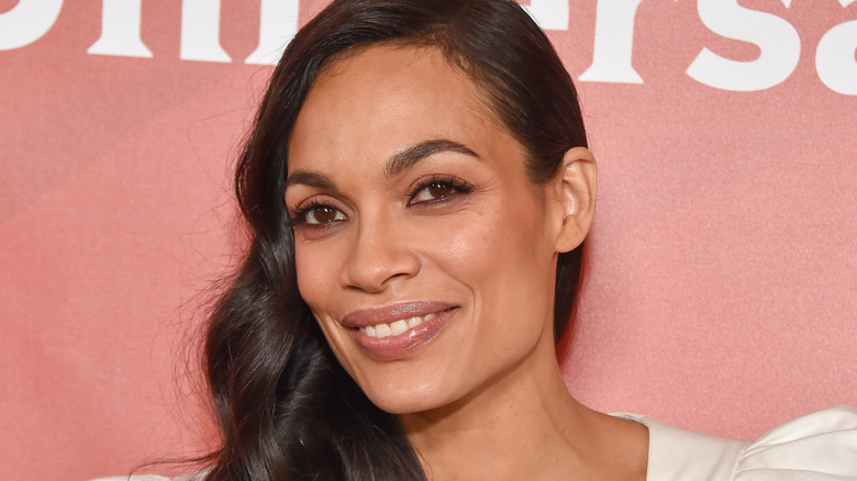 Rosario Dawson smiles