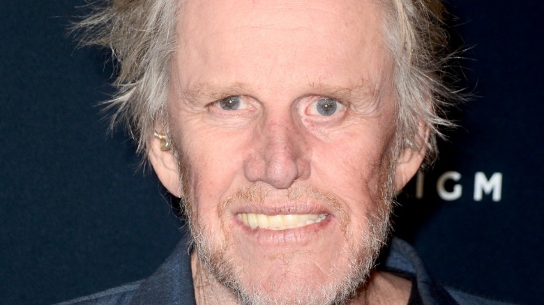 Gary Busey laughing outside