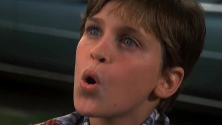 Joaquin Phoenix as a child with open mouth