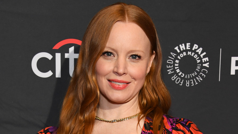 Lauren Ambrose wears a necklace