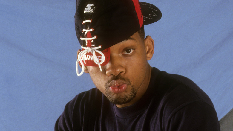 Will Smith in a backwards hat