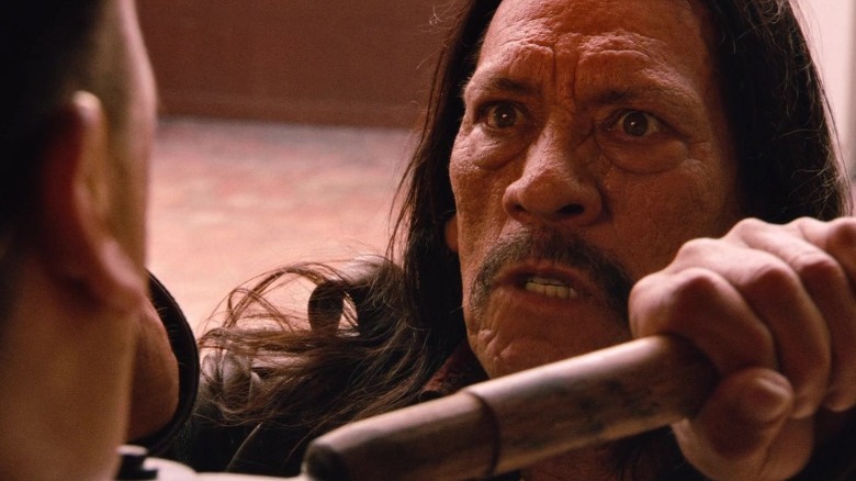 Machete fighting and looking angry