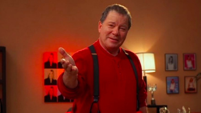 William Shatner wears part of a Santa costume