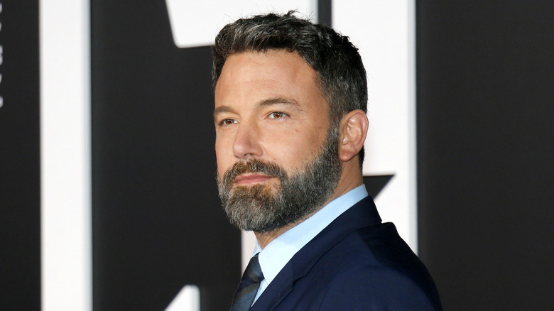 Bearded Ben Affleck wearing suit