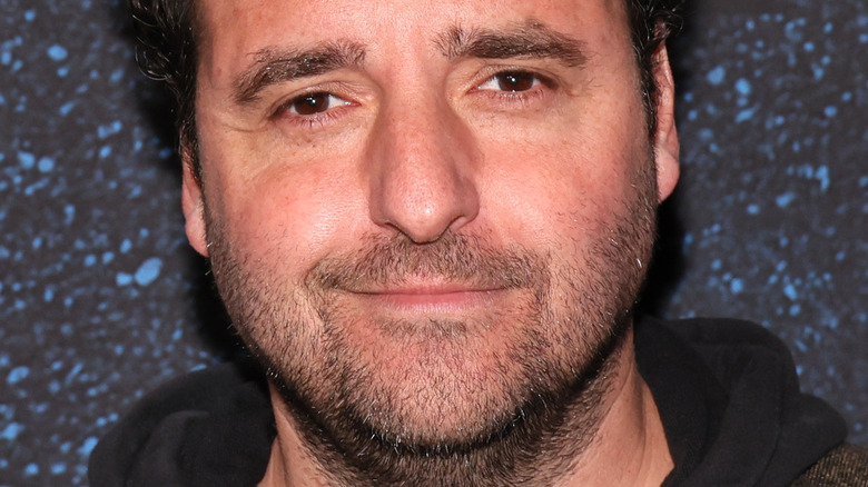 David Krumholtz smiling at a premiere in 2022