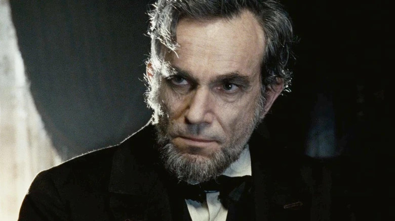 Daniel Day-Lewis as Abraham Lincoln looking left