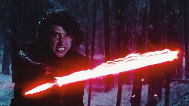 Kylo Ren pointing lightsaber