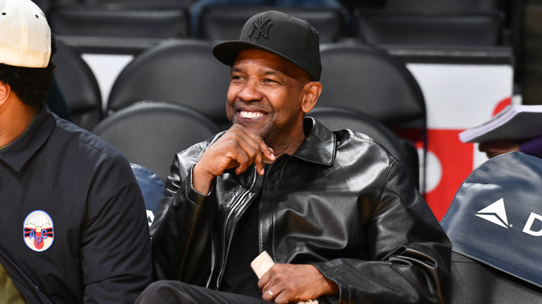 Denzel Washington watching basketball