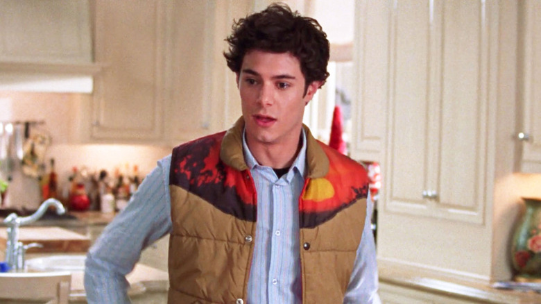 Seth in a vest on the O.C.