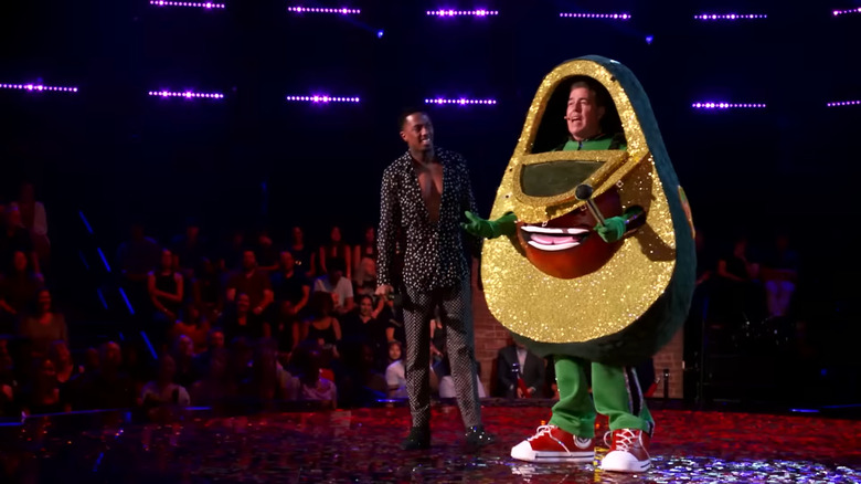 Adam Carolla and Nick Cannon on The Masked Singer