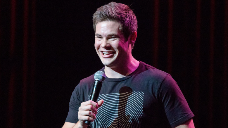 Adam Devine performing stand-up