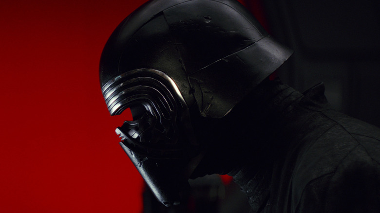 Kylo Ren brooding wearing helmet