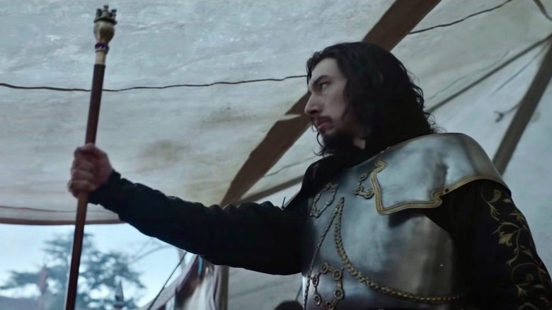 Adam Driver holds scepter