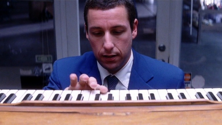 Adam Sandler playing piano