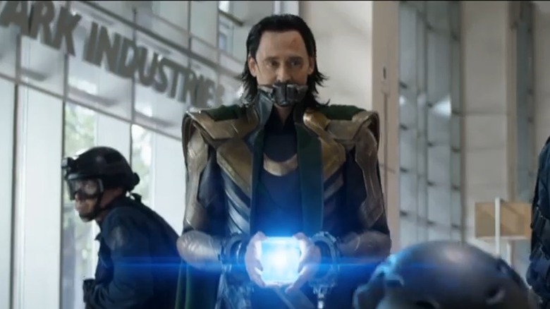 Loki holding the Tesseract