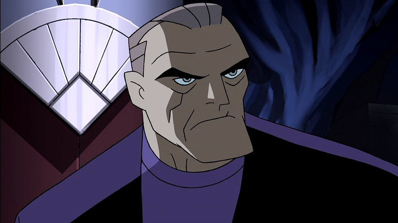 Batman Beyond's Bruce Wayne frowning