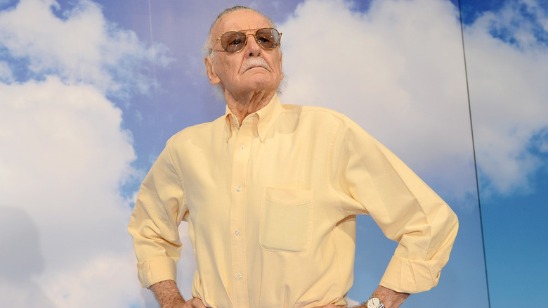 Stan Lee strikes a heroic pose