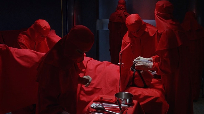 A red-robed operating room