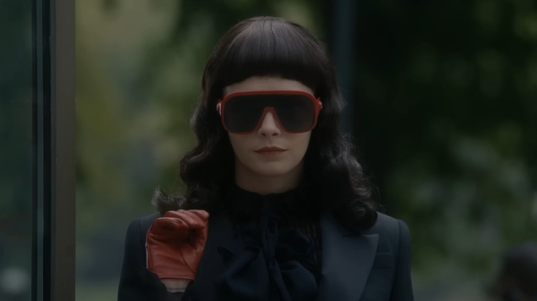 Stranger in sunglasses in AHS: Delicate